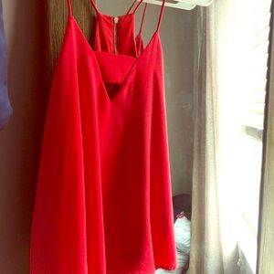 Red sleeveless blouse